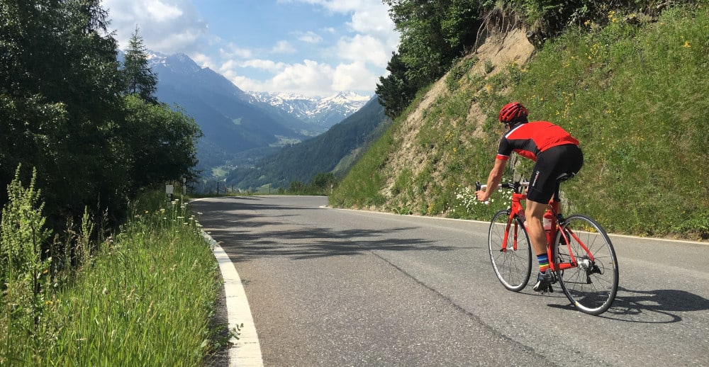 Road cycling in the summer in the Swiss Alps