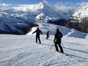 ES Instructors practice simple exercises which will improve a clients ability to stand properly on their skis. 